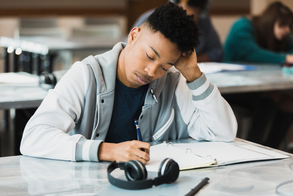 Teen student takes an exam